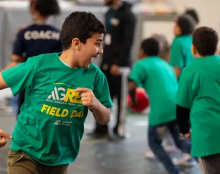 An Asphalt Green Recess Enhancement Program participates in an organized game.