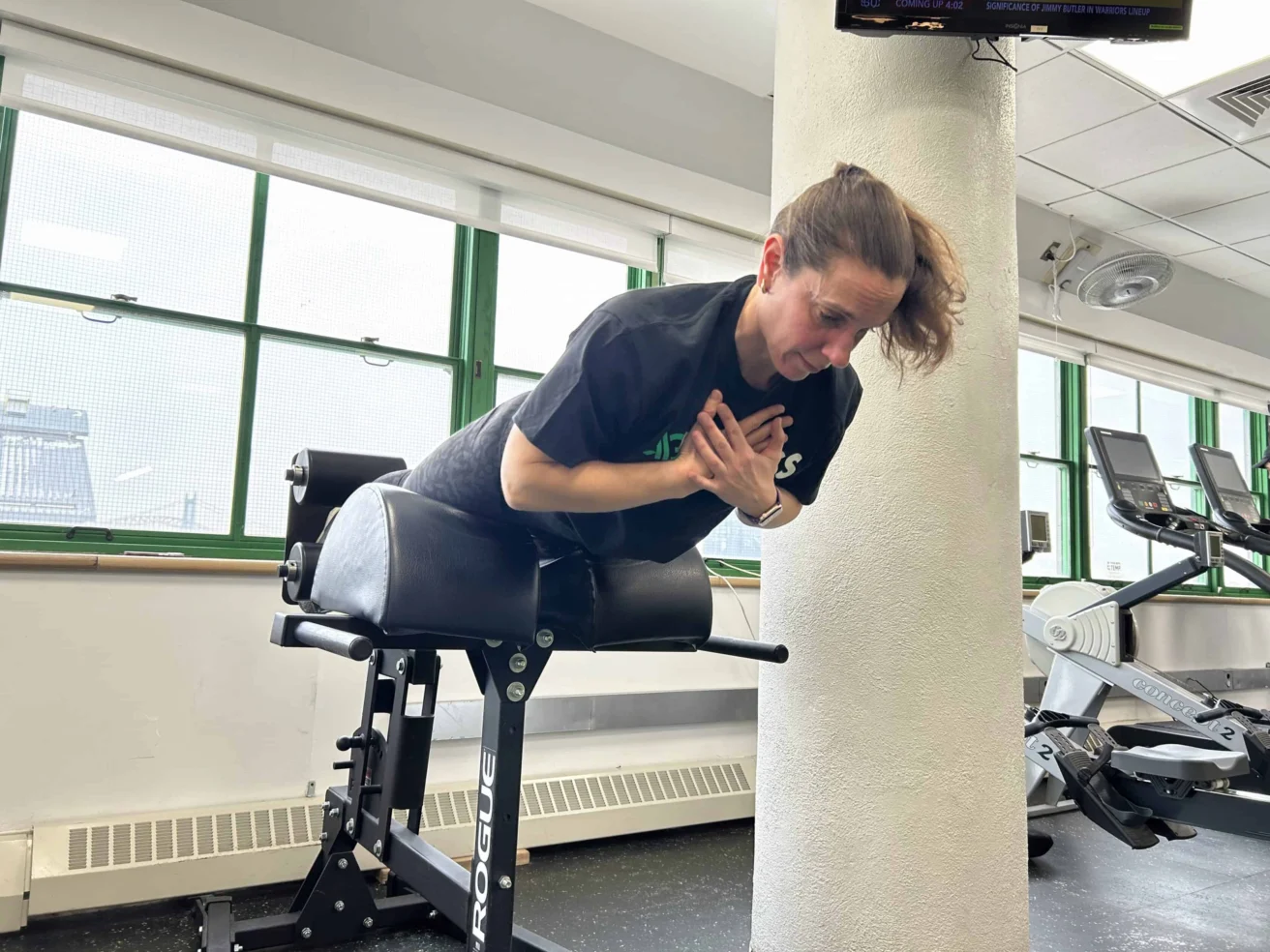 Asphalt Green Director of Fitness Nicole Lee performs a rep on the GHD Machine