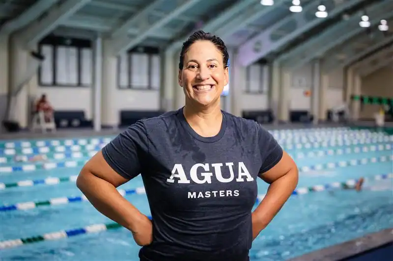 AGUA Masters Swimmer Fleur Sohtz on the pool deck