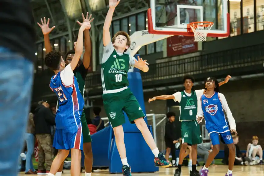 An AG Basketball youth basketball player blocks a pass at a recent NYC youth basketball tournament. 