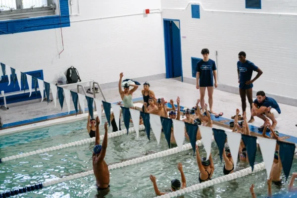 A group of swimmers take part in an AGUA swim clinic at River East Elementary School.