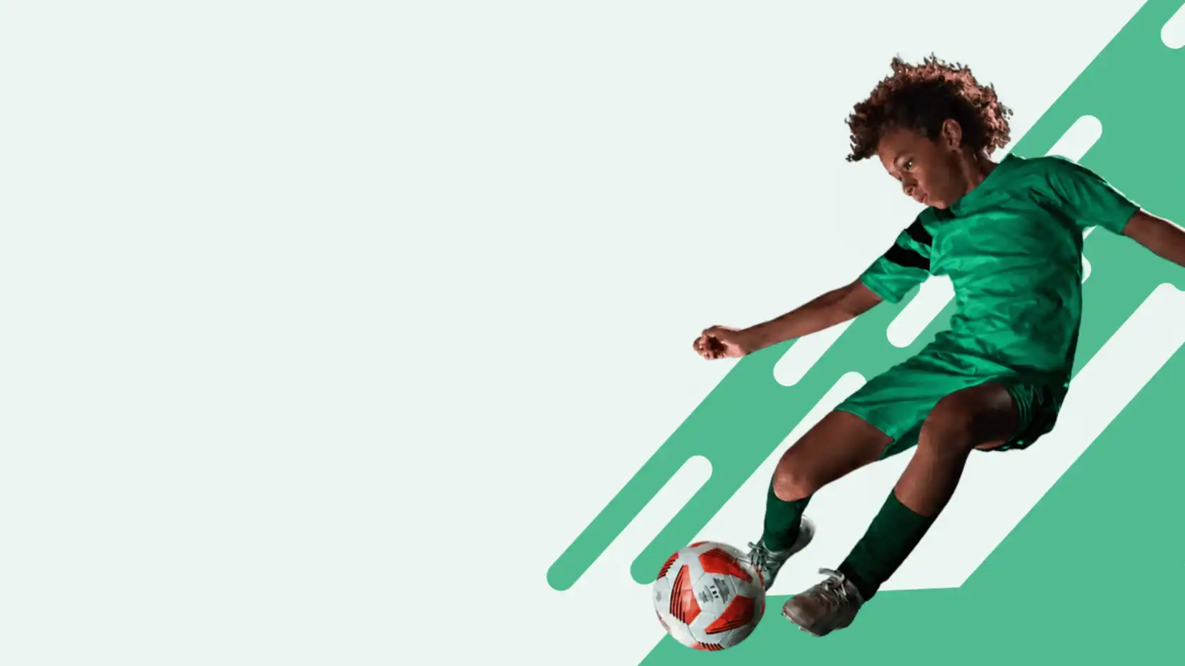 A child in a green soccer uniform kicks a red and white soccer ball while jumping, with a graphic green pattern in the background—join our programs and let your child experience the excitement of the game!.
